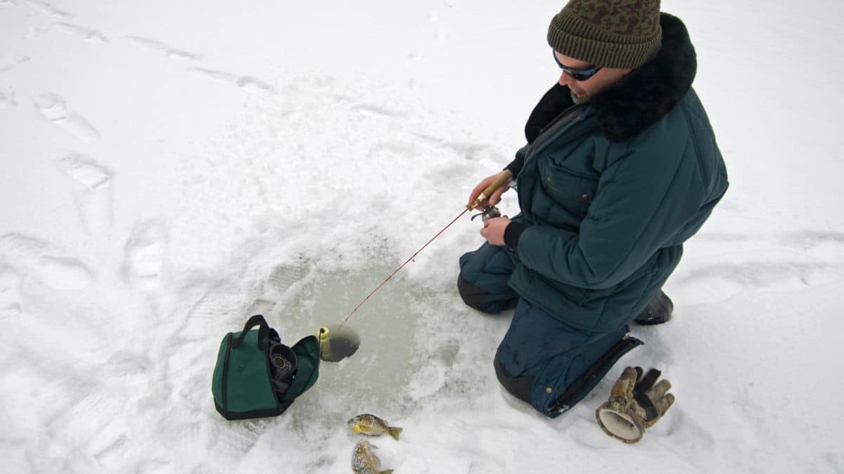 Man ice fishing