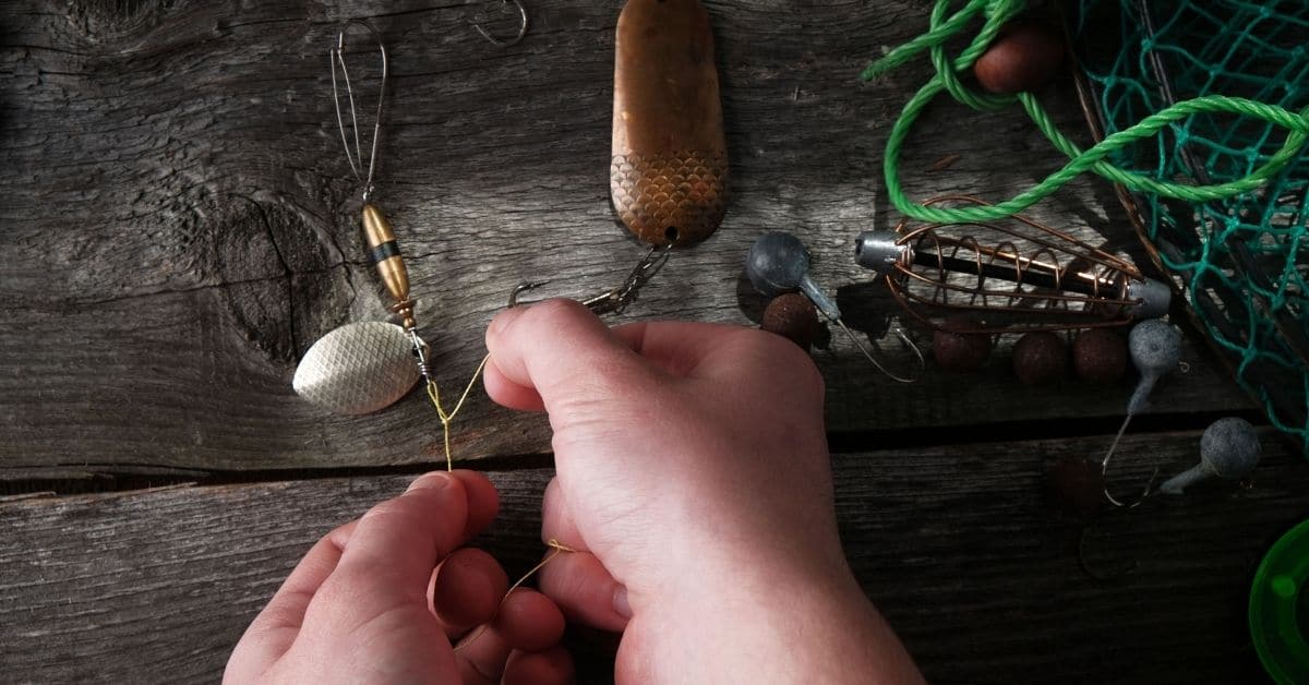 Angler tying a fishing knot